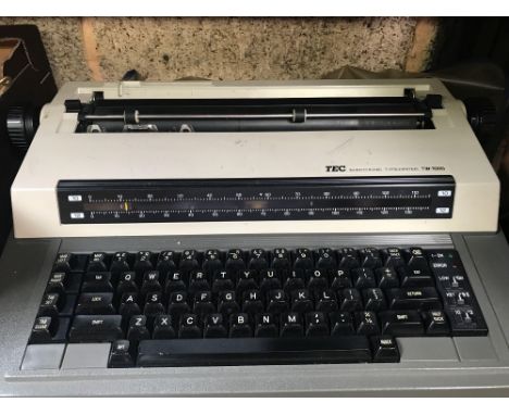 TEC ELECTRONIC TYPEWRITER TW1000 &amp; A BOX OF RIBBON TAPES