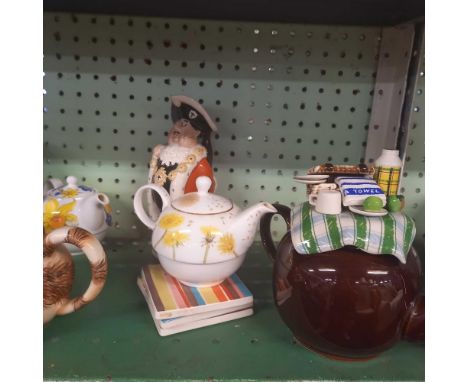 SHELF OF NOVELTY TEA POTS