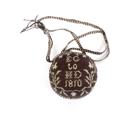A good early 19th Century knitted pin ball in near mint condition, executed in cream and brown, one side inscribed ‘EG to HD 
