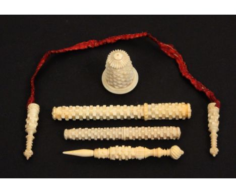 A mixed lot of 19th Century ivory sewing tools, in the stacked brick pattern comprising two cylinder needle cases, 9.5 and 7.