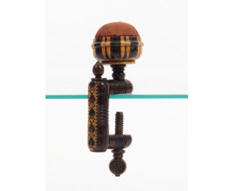 A rosewood Tunbridge ware sewing clamp, the turned frame with mosaic band and roundel turned screw below a stick ware bowl fo