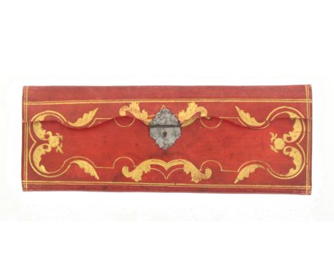 An early 19th Century red and gilt tooled knitting needle and netting case, polished steel catch, the interior in blue silk w