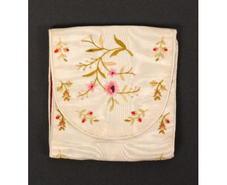 A mid 19th Century needle packet and needle flannel wallet, in ivory watered silk embroidered in coloured silks with flowerin