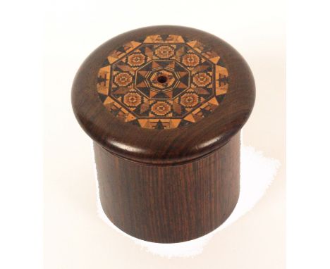 A Tunbridge ware turned rosewood cylinder string box, the domed over hanging screw lid with an inset circular panel of mosaic