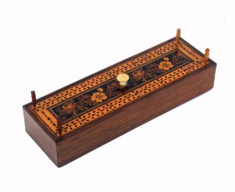 A Tunbridge ware rosewood cribbage box, of rectangular form, the lift off lid with central bone handle and a panel of floral 