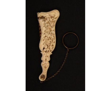 A fine 19th Century carved ivory carnet de ball, of cornucopia form the cover carved and pierced with flowers and leaves, wit