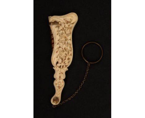 A fine 19th Century carved ivory carnet de ball, of cornucopia form the cover carved and pierced with flowers and leaves, wit