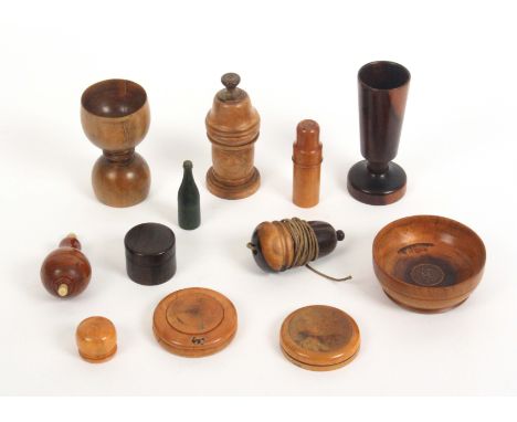 Treen etc – twelve pieces, comprising a lignum vitae acorn form plumb bob, 8cms, a similar bowl with inset coin dated 1835, 8