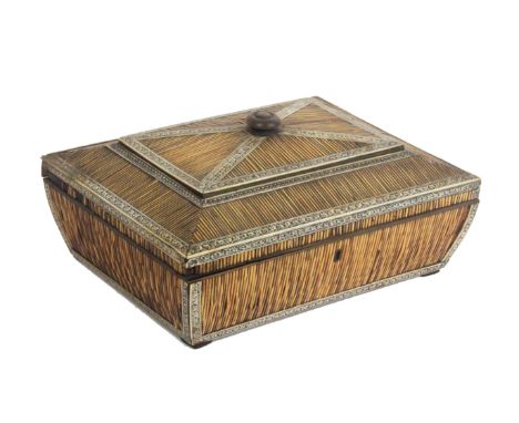 An early 19th Century Anglo Indian sewing box, of sarcophagal form in porcupine quill with engraved Vitzagapatam ivory border