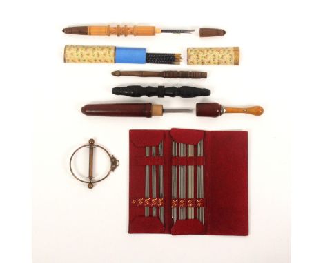 Knitting, a Tyrolean carved wood knitting needle case, 23cms, another in carved ebony, 18.5cms, an umbrella form example lack