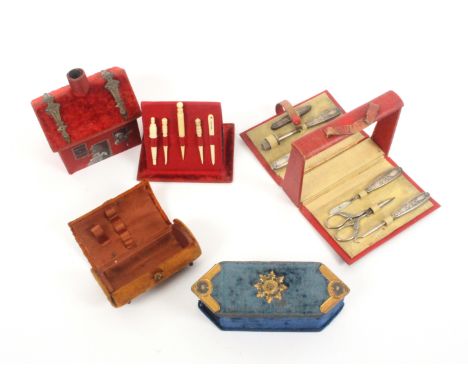 Four late 19th Century novelty sewing companions, comprising an example in red silk and plush in the form of a house with pai