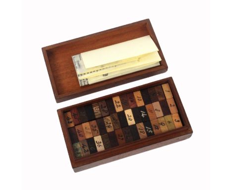 A rare Tunbridge ware specimen woods sample box attributed to Edmund Nye, the rectangular mahogany box with an inset circle o