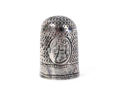 A rare Charles II commemorative silver thimble, with two oval panels, one depicting a wedding bust portrait of Charles II and