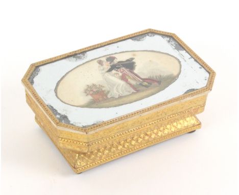 A good early 19th Century French cardboard, gilt foil and glass bonbonniere, of canted rectangular form the sides angled and 