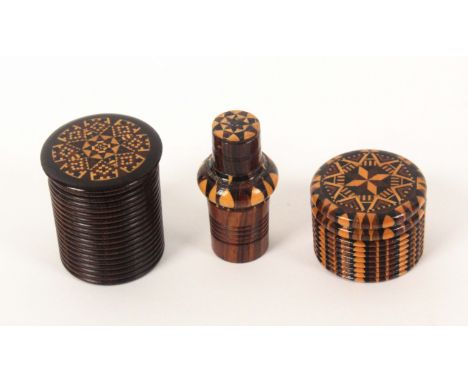 Tunbridge ware – three pieces, comprising a stick ware cylinder box, 3cms dia., another cylinder box in rib turned rosewood w