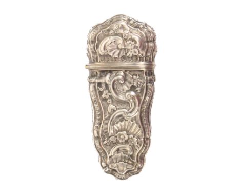 A late 18th Century silver etui, unmarked, the case decorated with flowers, leaves, shells and scrolls, the hinged cover reve