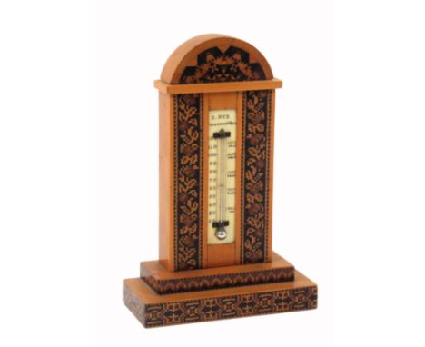 A Tunbridge ware desk thermometer by Edmund Nye, the satinwood stepped base edged in geometric mosaic, the ivory scale with m