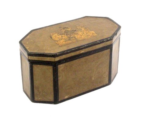 A Georgian paper covered box in the form of a tea caddy, of elongated octagonal form covered in green paper with black paper 