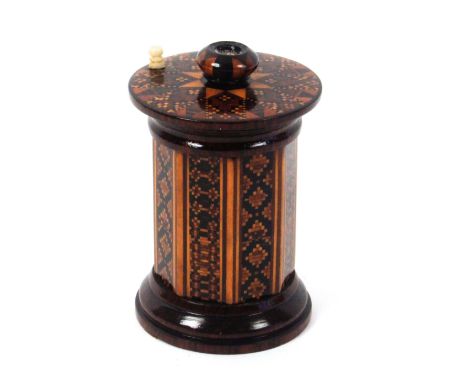 A Tunbridge ware rosewood go to bed, the circular base incorporating a striker, the octagonal body in geometric mosaic below 