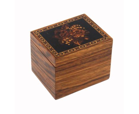 A Tunbridge ware tea caddy, of rectangular form, the lid with a mosaic panel of flowers set in ebony within a border of geome