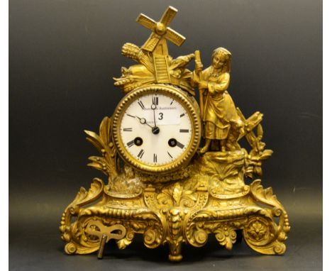 A 19th Century French gilt mantel clock, enamel dial, Roman numerals, twin winding holes