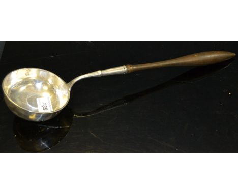 A large 19th century silver coloured metal ladle, turned handle