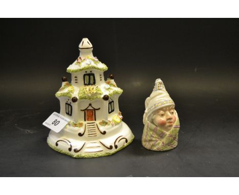 A Worcester candle snuffer, puce backstamp, (faults); The Dower House by Coalport (2)