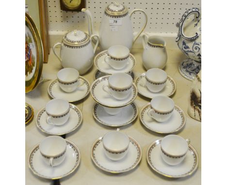 An Austrian part coffee service consisting of a coffee pot, sucrier, cream jug, cups and saucers