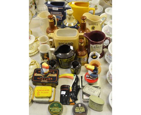 Breweryana - a Carltonware Guinness flat back; a pair of Guinness Toucan condiments; Bells whiskey decanters; water jugs; var