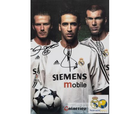 A Real Madrid "Galactico" David Beckham, Raul and Zinedine Zidane signed colour photographic print, signed in black marker pe