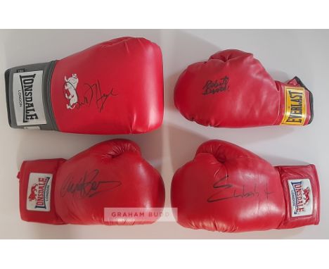 Boxing Legends, four gloves signed by Robert “Mano de Piedra” Duran, Nigel “The Dark Destroyer” Benn, David “The Hayemaker” H