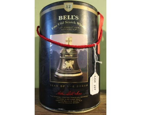 A Bells 12-years old Scotch Whisky in year of the sheep celebration decanter