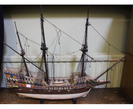 A painted wood model galleon, 56cm high