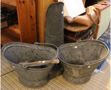 Three vintage coal scuttles including coal and a hammer