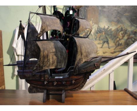A painted wood model galleon, 56cm high