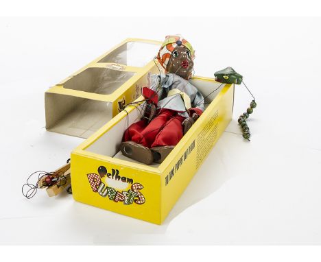 A Pelham Puppet Snake Charmer,  in red trousers, light blue top and multicoloured turban, in original yellow window box, VG, 