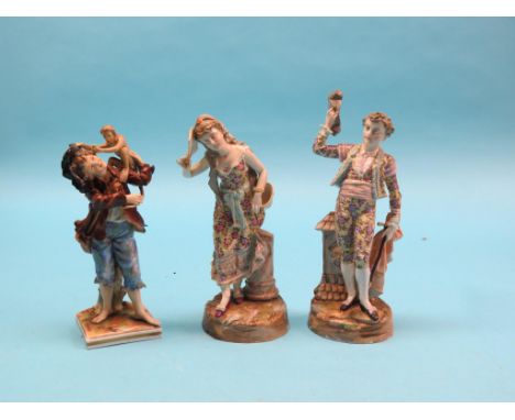 A pair of 19th century Volkstedt porcelain figures, male with sword, female with fan, fork marks in underglaze blue, 11in. - 