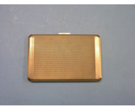 An engine-turned 9ct. gold cigarette case, Birmingham, 1937, 158.5 grams