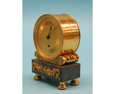 An early 19th century gilt-brass mantel clock, circular dial engine-turned with anthemions, Breguet hands, timepiece movement