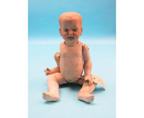 A rare German bisque Kaiser Baby doll by Fritz Bierschenk, open-closed mouth, painted intaglio eyes, solid dome head, bent-li