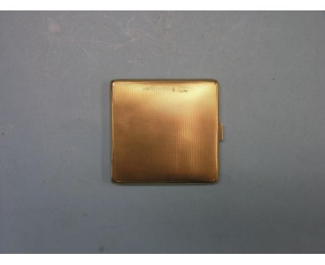 An engine-turned 9ct. gold cigarette case, Birmingham 1935, 90.4 grams gross