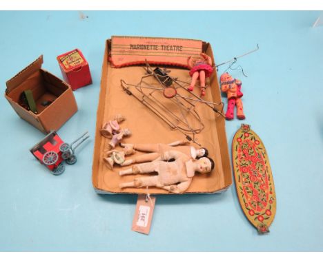A 1930's Japanese celluloid toy, Mechanical Marionette Theatre, German shoulder-head doll, three ceramic pin-cushion dolls, d