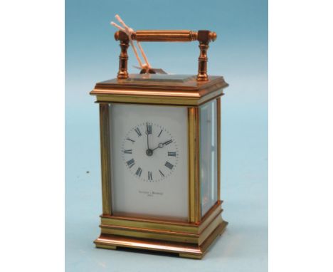 A gilt-brass carriage clock, enamelled dial signed Ollivant & Botsford, Paris, unsigned French movement striking on a gong, 7