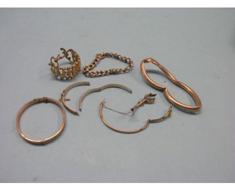 A 9ct. gold bracelet, double-scroll design with expanding action, 10.1 grams, a yellow metal hollow-link bracelet, a 9ct. gol