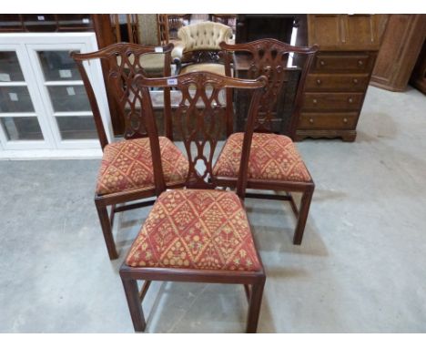 A set of three Chippendale style dining chairs of recent manufacture