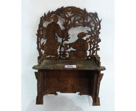 A fret carved display shelf. 9½' wide