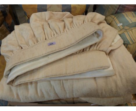 A pair of cream lined and interlined curtains with pelmet, together with a box of textiles