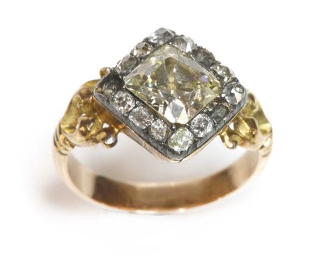 A Georgian diamond cluster ring,with later shoulders and shank, for restoration. The cushion cut diamond with a known weight 