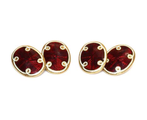 A pair of early 20th century gold and enamel set chain link cufflinks,with lightly domed oval plates, deep red guilloché enam