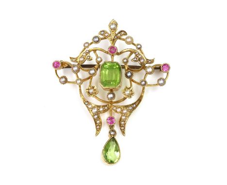 An Edwardian peridot, pink tourmaline and split pearl brooch/pendant, c.1900,of scrolling cartouche form. An octagonal step c